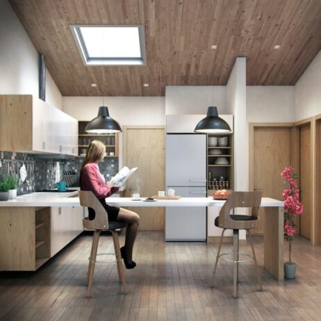 Cocina moderna de planos de casa de campo mar con isla central, techos de madera y luz natural.