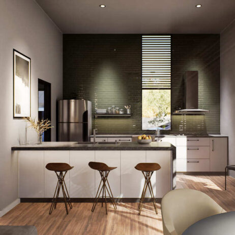 Cocina moderna de los [Planos de Casa pequeña Mía] con gabinetes blancos y una barra con tres bancos de madera. Se aprecia un fondo de azulejos oscuros brillantes, una ventana con persiana de lamas y electrodomésticos de acero inoxidable.