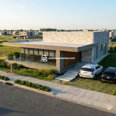 Planos de casa moderna Viesca: Diseño y Vanguardia Fachada de hormigón y piedra según los planos de casa moderna Viesca con amplios ventanales y diseño contemporáneo.