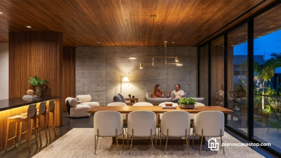 Interior de lujo diseñado según los planos de casa moderna Viesca con techos de madera y muros de concreto.