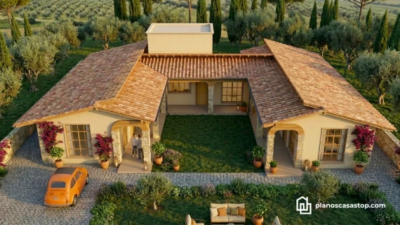 Vista aérea de los Planos de casa colonial cedros con patio central, techos de teja roja y entorno campestre rústico.