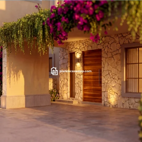 Planos de casa colonial Sauce: Elegancia y Piedra Natural Entrada con muros de piedra natural y puerta de madera según los planos de casa colonial Sauce con flores de bugambilias.