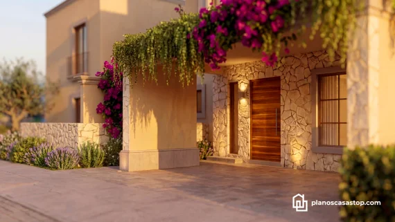 Entrada con piedra natural y puerta de madera siguiendo los Planos de casa colonial Sauce con bugambilias vibrantes.