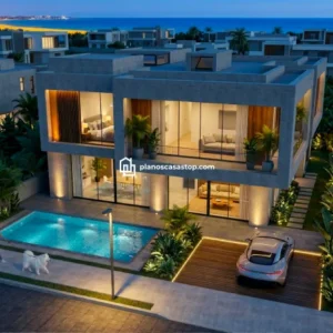 Render nocturno de villa de lujo con alberca y vista al mar, basado en planos de casa moderna Vallarta con grandes ventanales.