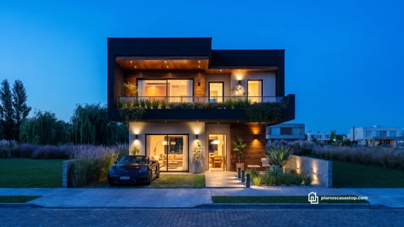 Fachada moderna del modelo Laurel plano de casa de 2 pisos con iluminación cálida y acabados en madera y negro.