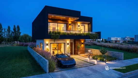 Fachada moderna de Laurel plano de casa de 2 pisos con iluminación cálida, acabados en madera y volúmenes contrastantes.